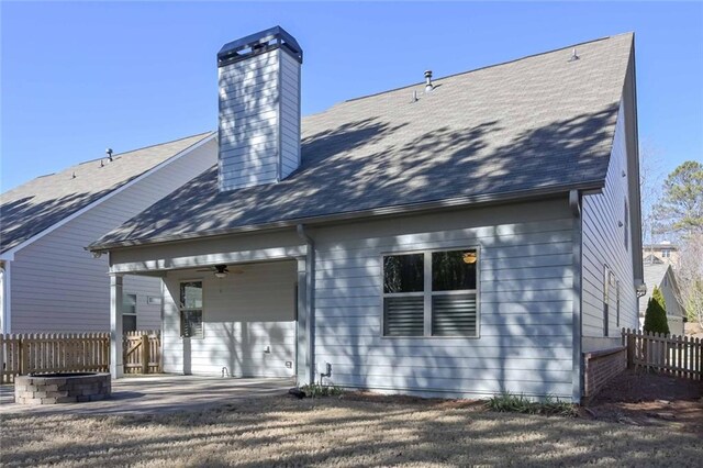 back of property featuring a patio and ceiling fan