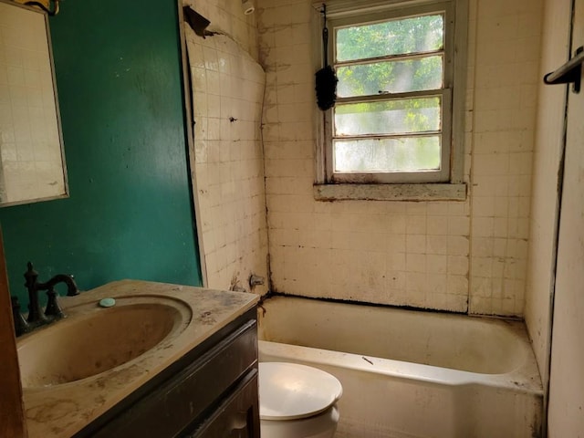 3567 Morgan Dr, Macon, GA 31204 - bathroom featuring vanity, toilet, and shower / tub combination
