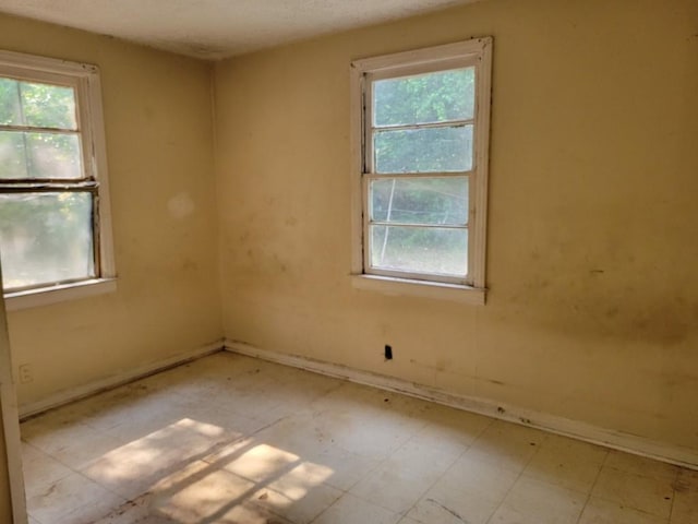 3567 Morgan Dr, Macon, GA 31204 - unfurnished room with baseboards and tile patterned floors