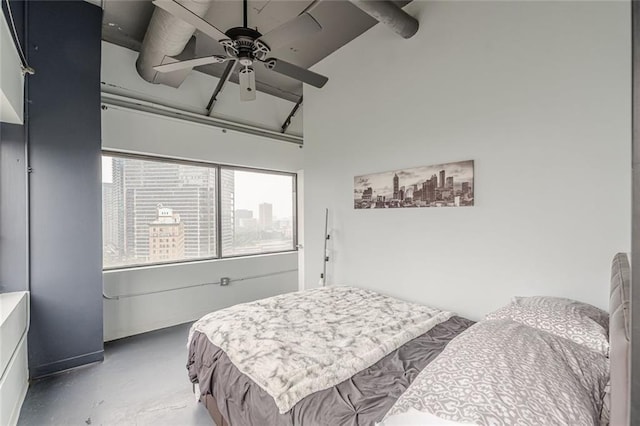 120 Ralph Mcgill Blvd NE Unit 1502, Atlanta, GA 30308 - bedroom with finished concrete flooring, high vaulted ceiling, beam ceiling, and ceiling fan
