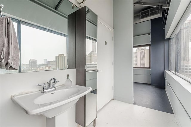 120 Ralph Mcgill Blvd NE Unit 1502, Atlanta, GA 30308 - bathroom featuring concrete floors and a city view