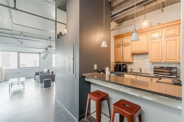 120 Ralph Mcgill Blvd NE Unit 1502, Atlanta, GA 30308 - kitchen featuring backsplash, a ceiling fan, light brown cabinetry, a breakfast bar area, and a high ceiling