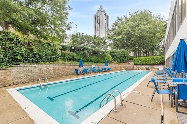 120 Ralph Mcgill Blvd NE Unit 1502, Atlanta, GA 30308 - community pool featuring a patio area