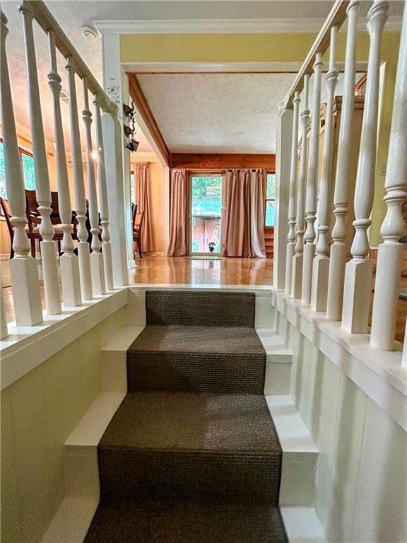 stairway with crown molding