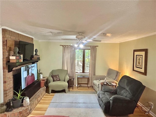 interior space with a textured ceiling, hardwood / wood-style flooring, and ceiling fan