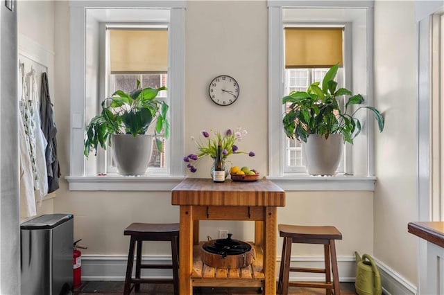 dining space featuring baseboards