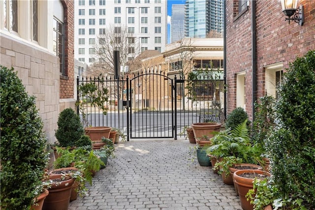 view of gate with fence