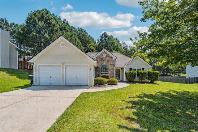 2410 Napa Valley Dr, Villa Rica, GA 30180 - ranch-style house with stone siding, a garage, and concrete driveway