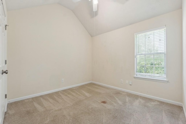 2410 Napa Valley Dr, Villa Rica, GA 30180 - empty room featuring carpet, lofted ceiling, and a ceiling fan