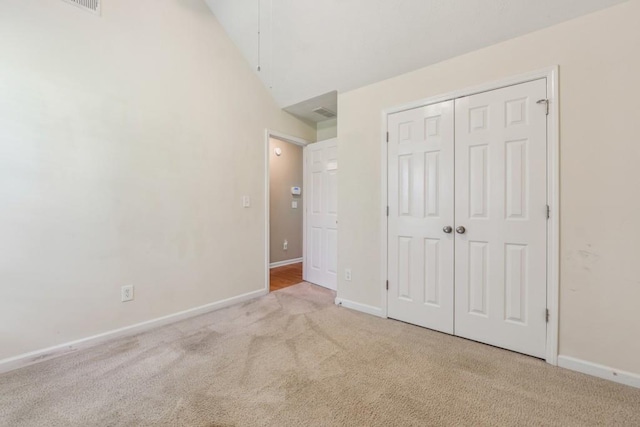 2410 Napa Valley Dr, Villa Rica, GA 30180 - unfurnished bedroom with carpet flooring and a closet