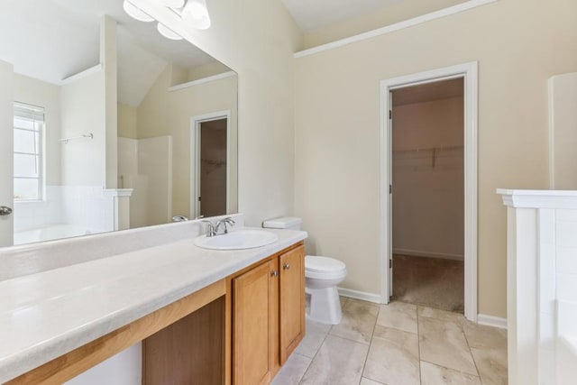 2410 Napa Valley Dr, Villa Rica, GA 30180 - bathroom with a walk in closet, a garden tub, a walk in shower, vanity, and vaulted ceiling