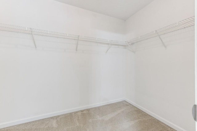 2410 Napa Valley Dr, Villa Rica, GA 30180 - spacious closet featuring carpet floors