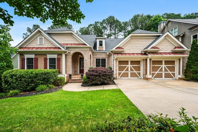 37 Misty Hill Trl, Dallas, GA 30132 - craftsman house featuring an attached garage, driveway, brick siding, a front lawn, and a shingled roof