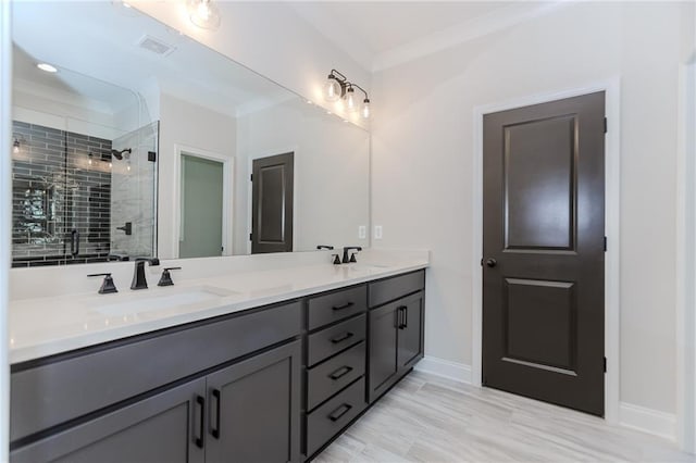 full bathroom with double vanity, visible vents, a sink, and a stall shower