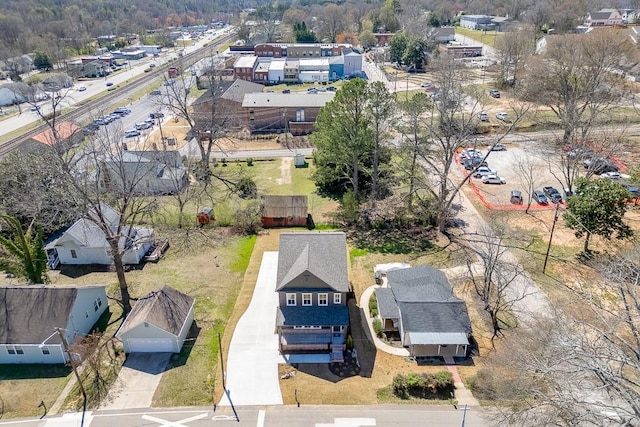 birds eye view of property with a residential view