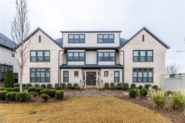 view of front of property with a front lawn