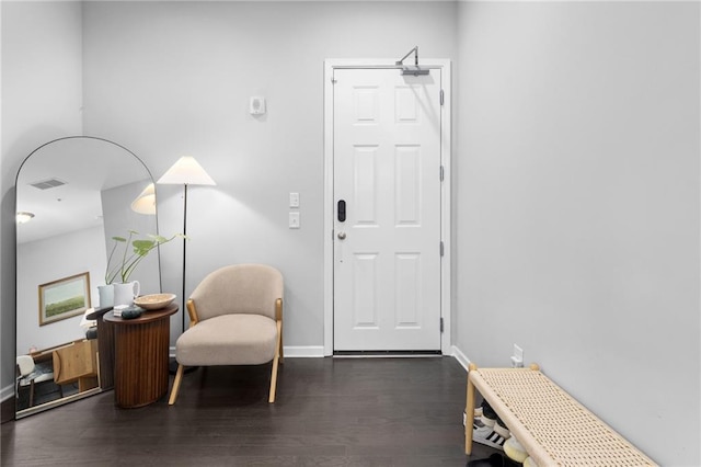 entryway with dark wood-type flooring