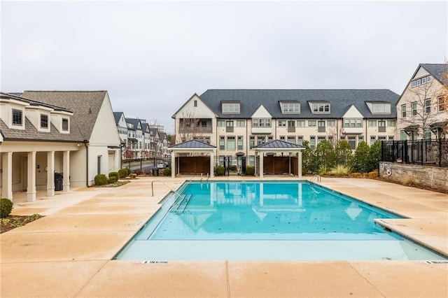 view of swimming pool with a patio