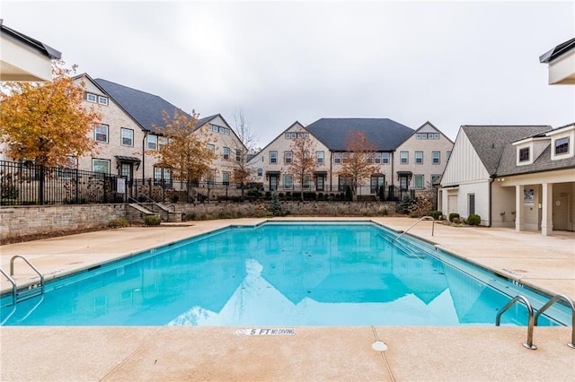 view of swimming pool featuring a patio