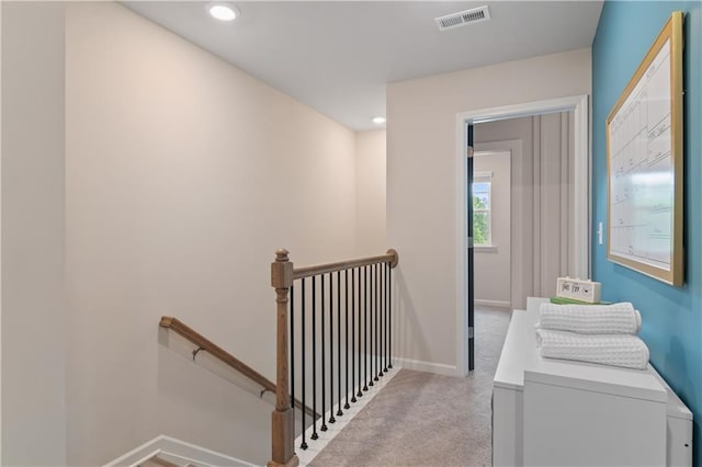 stairs featuring carpet floors, baseboards, and recessed lighting