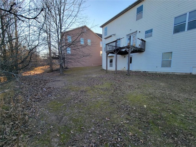 view of yard featuring a deck