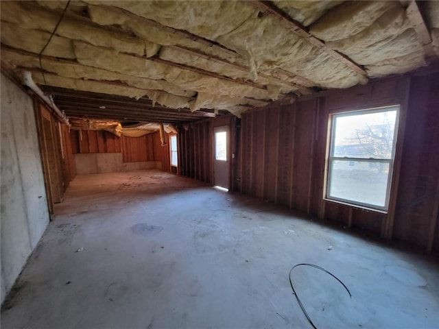 interior space featuring unfinished concrete floors