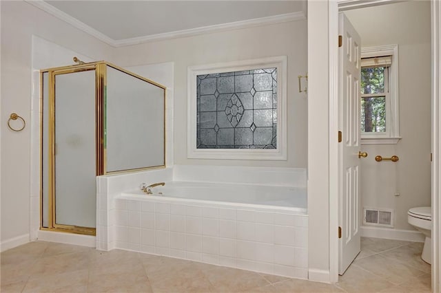 bathroom featuring separate shower and tub, toilet, and ornamental molding