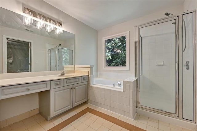 bathroom with vanity, separate shower and tub, and tile patterned flooring