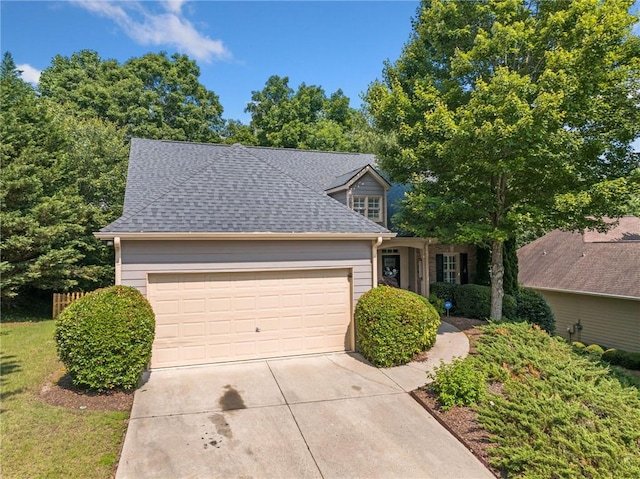 139 Mountain Vista Blvd, Canton, GA 30115 - view of front facade with a garage, driveway, and roof with shingles