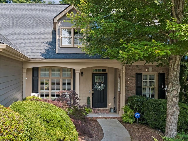 139 Mountain Vista Blvd, Canton, GA 30115 - entrance to property featuring a shingled roof, covered porch, and brick siding