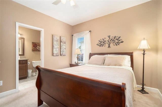 4653 Glory Maple Trce, Powder Springs, GA 30127 - bedroom with light carpet, ensuite bathroom, and ceiling fan