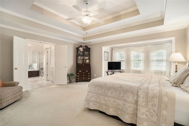 4653 Glory Maple Trce, Powder Springs, GA 30127 - carpeted bedroom with a raised ceiling, ornamental molding, connected bathroom, and a ceiling fan