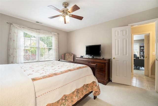 4653 Glory Maple Trce, Powder Springs, GA 30127 - bedroom featuring light carpet, light tile patterned floors, and ceiling fan