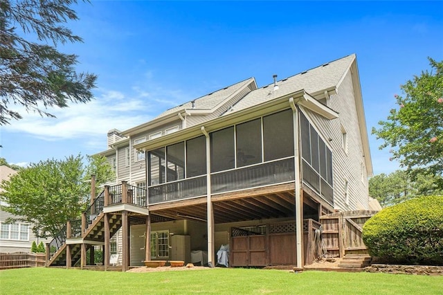 4653 Glory Maple Trce, Powder Springs, GA 30127 - rear view of house featuring stairway, a sunroom, a lawn, and a deck