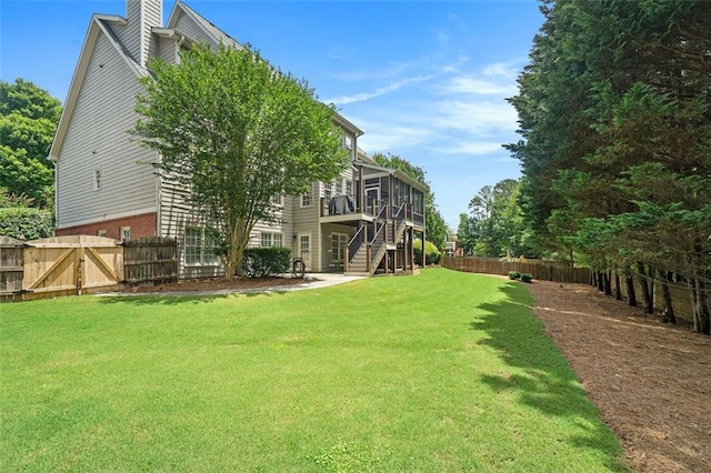 4653 Glory Maple Trce, Powder Springs, GA 30127 - fenced backyard with a sunroom and stairs