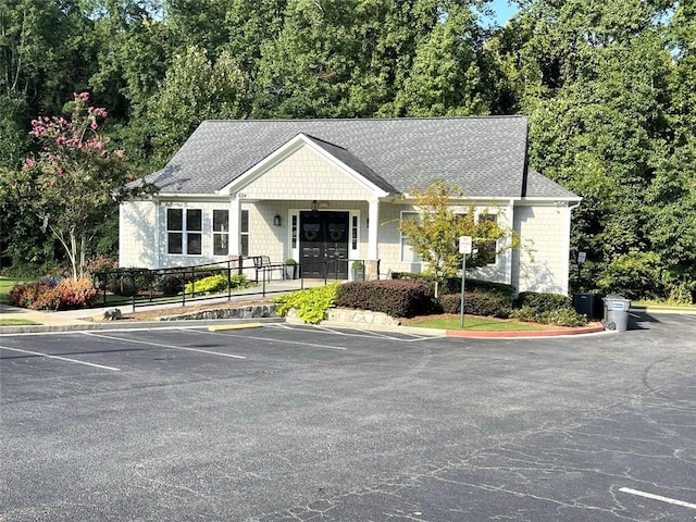 4653 Glory Maple Trce, Powder Springs, GA 30127 - view of building exterior featuring uncovered parking