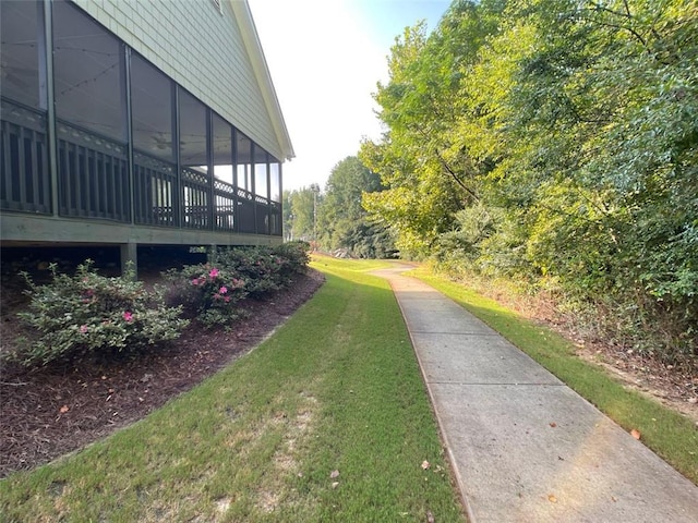 4653 Glory Maple Trce, Powder Springs, GA 30127 - view of grassy yard with a sunroom
