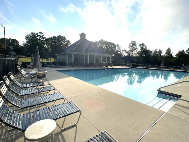 4653 Glory Maple Trce, Powder Springs, GA 30127 - community pool with a patio