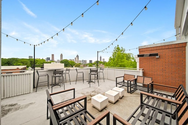 572 Edgewood Ave SE Unit 303, Atlanta, GA 30312 - view of patio featuring a view of skyline