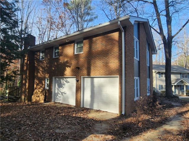 view of home's exterior with a garage