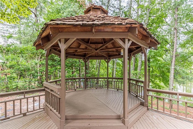 wooden terrace with a water view