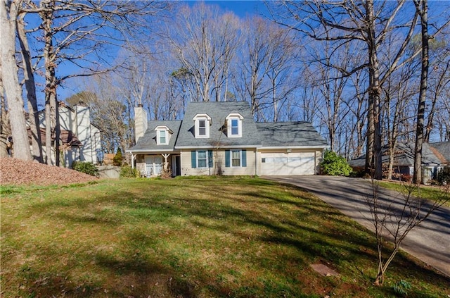 cape cod home with driveway, a front lawn, a chimney, and an attached garage