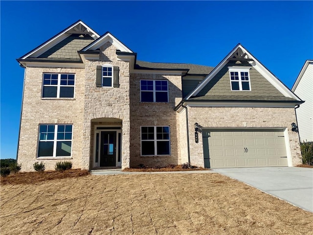 view of front of house featuring a garage, brick siding, and driveway