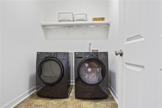 5355 Highland Pine Ln, Mableton, GA 30126 - laundry room featuring baseboards and washer and clothes dryer