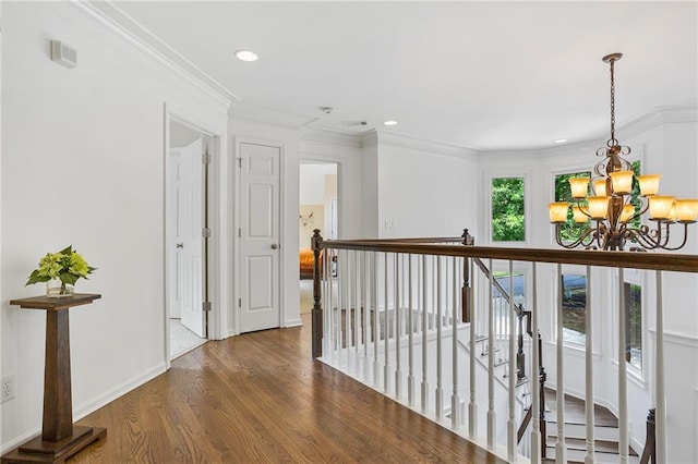 5355 Highland Pine Ln, Mableton, GA 30126 - hall with a chandelier, wood finished floors, crown molding, an upstairs landing, and recessed lighting