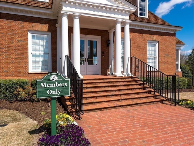 5355 Highland Pine Ln, Mableton, GA 30126 - entrance to property featuring french doors, brick siding, and covered porch
