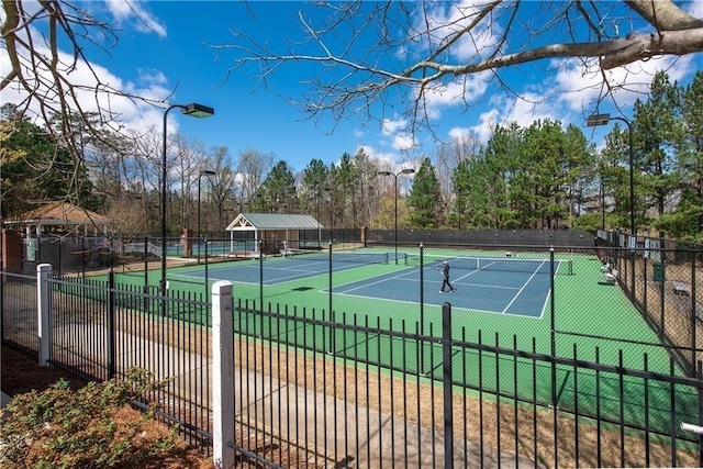 5355 Highland Pine Ln, Mableton, GA 30126 - view of tennis court with view of scattered trees