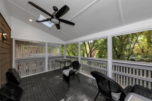 sunroom with vaulted ceiling and ceiling fan