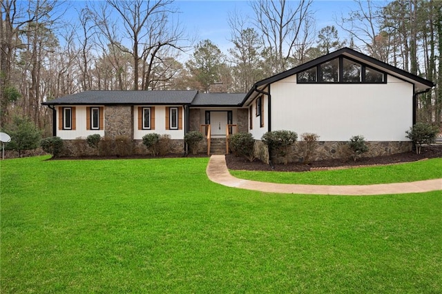 view of front of home featuring a front yard and crawl space