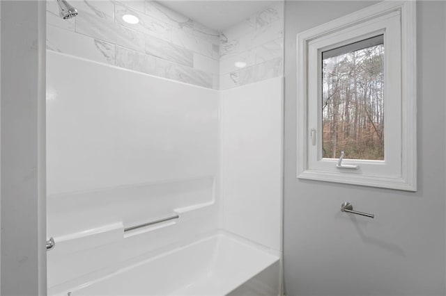 bathroom featuring tub / shower combination